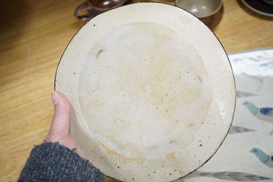 Jill Fanshawe Kato (b.1943), two studio pottery dishes, one decorated with pheasants, impressed marks to the bases, largest 34cm wide